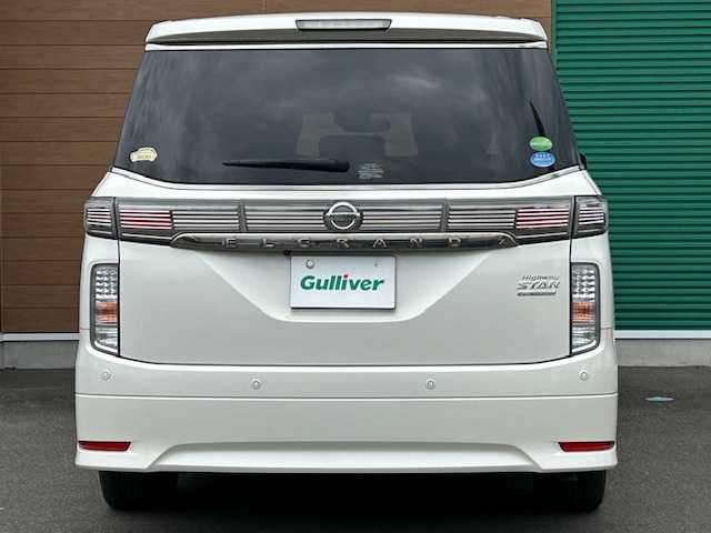 日産 エルグランド 250HWS プレミアム アーバンクロム 静岡県 2019(平31)年 7.3万km ブリリアントホワイトパール ワンオーナー/純正ナビ（フルセグTV、Bluetooth/後席モニター/前席パワーシート/レザーシート/両側パワースライドドア/オットマン/パワーバックドア/車外カメラ（バック/シートヒーター/ETC/純正アルミホイール/プッシュスタート/コーナーセンサー/ウォークスルー