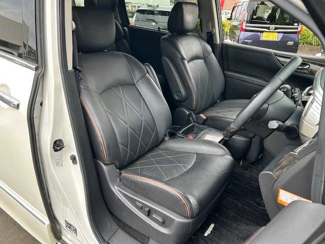 日産 エルグランド 250HWS プレミアム アーバンクロム 静岡県 2019(平31)年 7.3万km ブリリアントホワイトパール ワンオーナー/純正ナビ（フルセグTV、Bluetooth/後席モニター/前席パワーシート/レザーシート/両側パワースライドドア/オットマン/パワーバックドア/車外カメラ（バック/シートヒーター/ETC/純正アルミホイール/プッシュスタート/コーナーセンサー/ウォークスルー