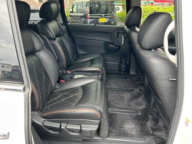 日産 エルグランド 250HWS プレミアム アーバンクロム 静岡県 2019(平31)年 7.3万km ブリリアントホワイトパール ワンオーナー/純正ナビ（フルセグTV、Bluetooth/後席モニター/前席パワーシート/レザーシート/両側パワースライドドア/オットマン/パワーバックドア/車外カメラ（バック/シートヒーター/ETC/純正アルミホイール/プッシュスタート/コーナーセンサー/ウォークスルー