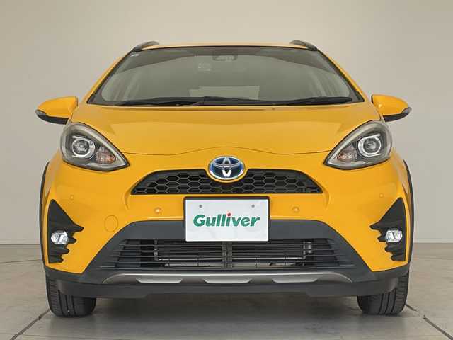 トヨタ アクア クロスオーバー グラム 愛知県 2019(令1)年 4.1万km イエロー トヨタセーフティセンス/純正9型ナビ/バックカメラ/シートヒーター/ハーフレザーシート/純正アルミホイール/純正フロアマット/ルーフレール/LEDヘッドライト/オートマチックハイビーム/ドライブレコーダー/ETC/衝突軽減システム/フルセグ/CD DVD/Bluetooth/ステアリングスイッチ/スマートキー/プッシュスタート