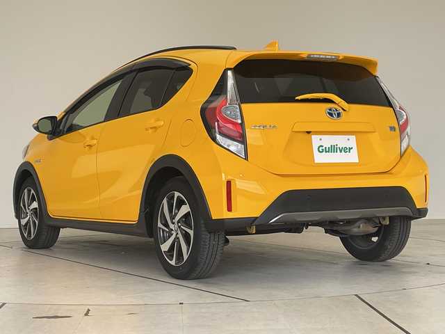 トヨタ アクア クロスオーバー グラム 愛知県 2019(令1)年 4.1万km イエロー トヨタセーフティセンス/純正9型ナビ/バックカメラ/シートヒーター/ハーフレザーシート/純正アルミホイール/純正フロアマット/ルーフレール/LEDヘッドライト/オートマチックハイビーム/ドライブレコーダー/ETC/衝突軽減システム/フルセグ/CD DVD/Bluetooth/ステアリングスイッチ/スマートキー/プッシュスタート