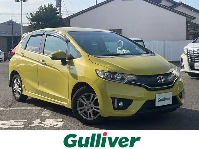 ホンダ フィット 13G Sパッケージ 愛知県 2014(平26)年 4.1万km アトラクトイエローパール ワンオーナー/純正メモリナビ/【フルセグ・DVD再生可・CD・Bluetooth】/バックカメラ/ETC/前方ドライブレコーダー/パドルシフト/横滑り防止機能/電動格納ミラー/ウィンカーミラー/ステアリングスイッチ/ECON/オートライト/純正フロアマット/ドアバイザー/新車保証書/取扱説明書