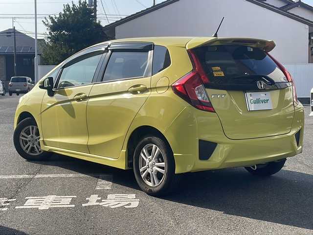ホンダ フィット 13G Sパッケージ 愛知県 2014(平26)年 4.1万km アトラクトイエローパール ワンオーナー/純正メモリナビ/【フルセグ・DVD再生可・CD・Bluetooth】/バックカメラ/ETC/前方ドライブレコーダー/パドルシフト/横滑り防止機能/電動格納ミラー/ウィンカーミラー/ステアリングスイッチ/ECON/オートライト/純正フロアマット/ドアバイザー/新車保証書/取扱説明書