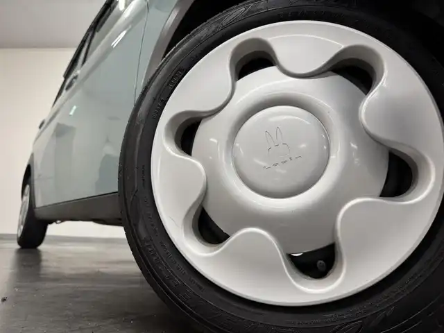 スズキ ラパン L 三重県 2024(令6)年 0.6万km オフブルーM ガソリン/FF/インパネCVT/カロッツェリア 7インチナビ AVIC-RW821-D/（FM/AM/TV/CD/DVD/Bluetooth/SD/USB/iPod/HDMI）/安全装備/・デュアルカメラブレーキサポート/・車線逸脱警報機能/・ふらつき警報機能/・誤発進抑制機能/・後方誤発進抑制機能/・リヤパーキングセンサー/・後退時ブレーキサポート/・標識認識機能（車両進入禁止、はみ出し通行禁止、最高速度、一時停止）/・ハイビームアシスト/など/装備/・シートヒーター（D）/・オートエアコン/・オートライトシステム/・LEDヘッドライト（ハイ/ロー）/・プッシュスタート/・ステアリングスイッチ/・電動格納ドアミラー/・純正ホイールキャップ＆14インチスチールホイール/・保/・スマートキーx1/など