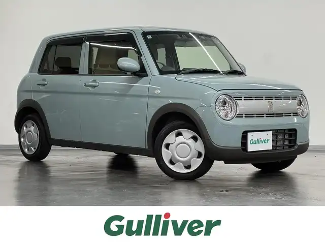 スズキ ラパン L 三重県 2024(令6)年 0.6万km オフブルーM ガソリン/FF/インパネCVT/カロッツェリア 7インチナビ AVIC-RW821-D/（FM/AM/TV/CD/DVD/Bluetooth/SD/USB/iPod/HDMI）/安全装備/・デュアルカメラブレーキサポート/・車線逸脱警報機能/・ふらつき警報機能/・誤発進抑制機能/・後方誤発進抑制機能/・リヤパーキングセンサー/・後退時ブレーキサポート/・標識認識機能（車両進入禁止、はみ出し通行禁止、最高速度、一時停止）/・ハイビームアシスト/など/装備/・シートヒーター（D）/・オートエアコン/・オートライトシステム/・LEDヘッドライト（ハイ/ロー）/・プッシュスタート/・ステアリングスイッチ/・電動格納ドアミラー/・純正ホイールキャップ＆14インチスチールホイール/・保/・スマートキーx1/など