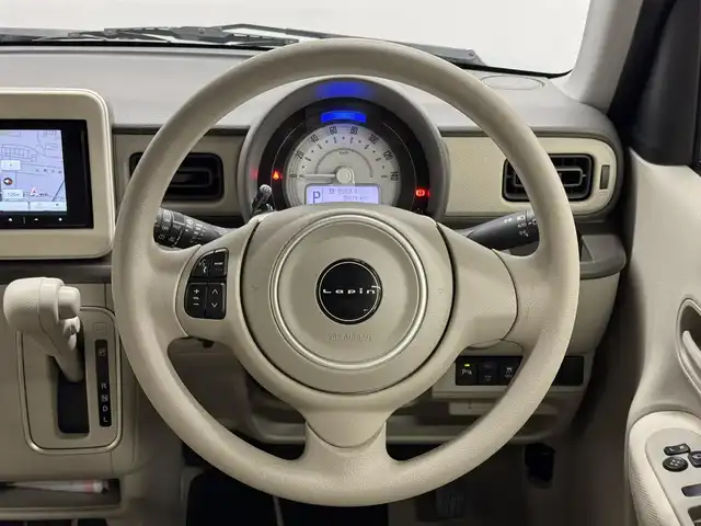 スズキ ラパン L 三重県 2024(令6)年 0.6万km オフブルーM ガソリン/FF/インパネCVT/カロッツェリア 7インチナビ AVIC-RW821-D/（FM/AM/TV/CD/DVD/Bluetooth/SD/USB/iPod/HDMI）/安全装備/・デュアルカメラブレーキサポート/・車線逸脱警報機能/・ふらつき警報機能/・誤発進抑制機能/・後方誤発進抑制機能/・リヤパーキングセンサー/・後退時ブレーキサポート/・標識認識機能（車両進入禁止、はみ出し通行禁止、最高速度、一時停止）/・ハイビームアシスト/など/装備/・シートヒーター（D）/・オートエアコン/・オートライトシステム/・LEDヘッドライト（ハイ/ロー）/・プッシュスタート/・ステアリングスイッチ/・電動格納ドアミラー/・純正ホイールキャップ＆14インチスチールホイール/・保/・スマートキーx1/など