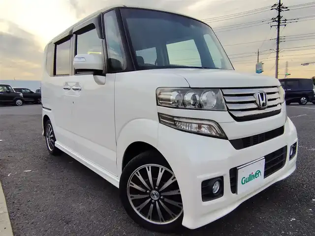 ホンダ Ｎ ＢＯＸ カスタム G ターボ Aパッケージ 石川県 2014(平26)年 9.3万km プレミアムホワイトパール 〇純正ナビ/〇ワンセグTV/〇パワースライドドア（両側）/〇バックカメラ/〇ETC/〇ターボ/〇アイドリングストップ/〇クルーズコントロール/〇シティブレーキアクティブシステム/〇HIDヘッドランプ/〇オートライト/〇純正15インチアルミ/〇革巻きステアリング/〇パドルシフト/〇オートエアコン/〇スマートキー/〇禁煙車