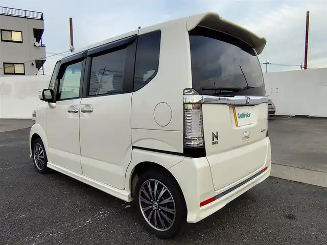 ホンダ Ｎ ＢＯＸ カスタム G ターボ Aパッケージ 石川県 2014(平26)年 9.3万km プレミアムホワイトパール 〇純正ナビ/〇ワンセグTV/〇パワースライドドア（両側）/〇バックカメラ/〇ETC/〇ターボ/〇アイドリングストップ/〇クルーズコントロール/〇シティブレーキアクティブシステム/〇HIDヘッドランプ/〇オートライト/〇純正15インチアルミ/〇革巻きステアリング/〇パドルシフト/〇オートエアコン/〇スマートキー/〇禁煙車