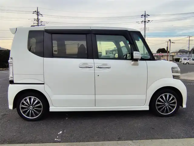 ホンダ Ｎ ＢＯＸ カスタム G ターボ Aパッケージ 石川県 2014(平26)年 9.3万km プレミアムホワイトパール 〇純正ナビ/〇ワンセグTV/〇パワースライドドア（両側）/〇バックカメラ/〇ETC/〇ターボ/〇アイドリングストップ/〇クルーズコントロール/〇シティブレーキアクティブシステム/〇HIDヘッドランプ/〇オートライト/〇純正15インチアルミ/〇革巻きステアリング/〇パドルシフト/〇オートエアコン/〇スマートキー/〇禁煙車