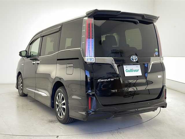 トヨタ エスクァイア ハイブリッド Gi プレミアムパッケージ ブラックテーラード 広島県 2020(令2)年 4.6万km ブラック ワンオーナー/純正SDナビ/フルセグテレビ/バックカメラ/CD/DVD/SD再生/Bluetooth接続/純正12.1インチフリップダウンモニター/ビルトインETC2.0/プッシュスタート/スマートキー（スペアキー1本）/電動格納ウィンカーミラー/純正15インチアルミホイール/ステアリングヒーター/前席シートヒーター/前後コーナーセンサー/クルーズコントロール/LEDヘッドライト/オートマチックハイビーム/トラクションコントロール/パーキングサポートブレーキ/先行車発進告知/レーンディパーチャーアラート/モデリスタエアロ