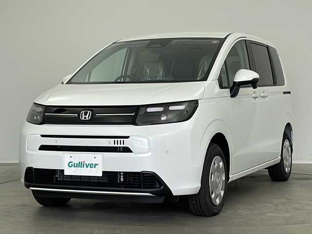 ホンダ フリード ハイブリット e:HEV AIR 新潟県 2025(令7)年 0.1万km未満 プラチナホワイトパール 4WD/純正9インチメモリナビ/(LXM-242ZFNi)/(フルセグ.Bluetooth.AppleCarPlay.AndroidAuto)/バックカメラ/ステアリングリモコン/LEDオートライト/両側パワースライドドア/ワイパーデアイサー/電動格納ウィンカーミラー/前席シートヒーター/プッシュスタート/スマートキー×2