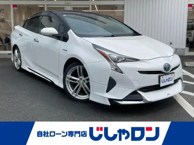 トヨタ プリウス S 大阪府 2016(平28)年 14.1万km スーパーホワイトⅡ (株)IDOMが運営する【じしゃロン東大阪店】の自社ローン専用車両になります。こちらは現金またはオートローンご利用時の価格です。自社ローンご希望の方は別途その旨お申付け下さい/純正7インチSDナビ 【NSCP-W64】/(AM/FM/TV/CD/BT/SD/AUX)/モデリスタエアロ/プリクラッシュセーフティ/レーダークルーズコントロール/レーンキープアシスト/バックカメラ/ビルトインＥＴＣ/LEDヘッドライト/オートハイビーム/スマートキー＆プッシュスタート/社外18インチアルミ/ステアリングスイッチ/スペアスマートキー
