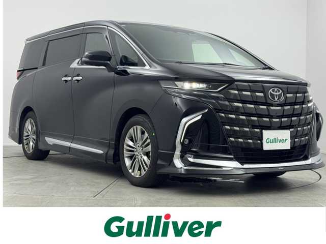 トヨタ アルファード Z 愛知県 2023(令5)年 3.8万km ブラック トヨタチームメイト/純正14型ナビ（フルセグ、Bluetooth、HDMI）/純正12型後席モニター/モデリスタエアロ/BSM/全方位カメラ/ETC2.0/ACC/置くだけ充電/ACC/デジタルインナーミラー/ドラレコ前後/100V電源/両側パワスラドア/パーキングアシスト/パワーバックドア/パワーシート（D+N)/シートヒーター、エアシート/レーンキープアシスト/コーナーセンサー/衝突軽減ブレーキ/LEDヘッドライト/オートハイビーム/純正アルミホイール/社外フロアマット/三点エアバック/横滑り防止装置/スマートキー