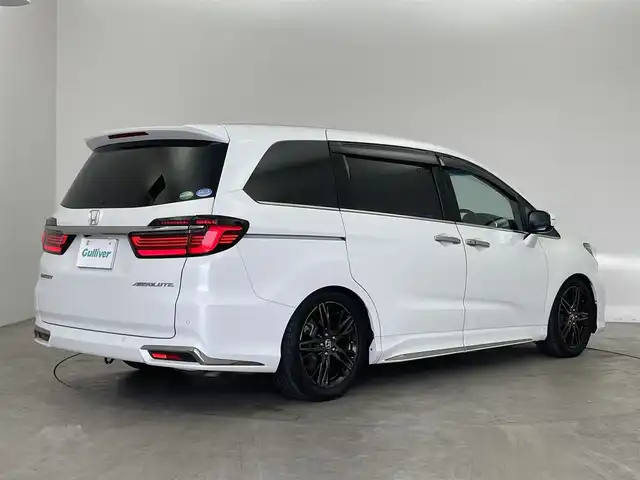 ホンダ オデッセイ アブソルート EX 埼玉県 2021(令3)年 2.2万km プラチナホワイトパール 純正１０インチナビ　フリップダウンモニター　マルチビューカメラ　ＢＳＭ　ビルトインＥＴＣ２．０　前後ドライブレコーダー　ホンダセンシング　アダクティブクルーズコントロール　シートヒーター　ＨＤＭＩ