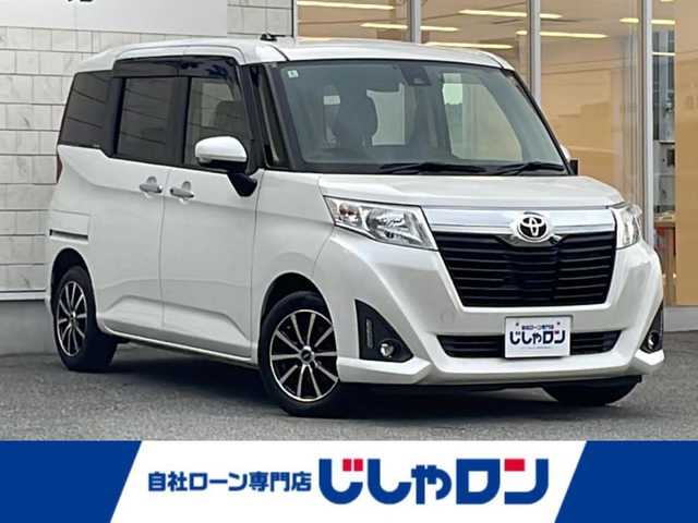 トヨタ ルーミー G－T 山口県 2018(平30)年 9.8万km パールホワイトⅢ (株)IDOMが運営する【じしゃロン宇部店】の自社ローン専用車両になります。こちらは現金またはオートローンご利用時の価格です。自社ローンご希望の方は別途その旨お申付け下さい。/純正ナビ(NSCN-W68)/バックカメラ　/Ｂｌｕｅｔｏｏｔｈ　/ドライブレコーダー　/純正フロアマット　/両側パワースライドドア　/社外アルミホイール　/横滑り防止装置　/衝突軽減防止装置　/ＥＴＣ
