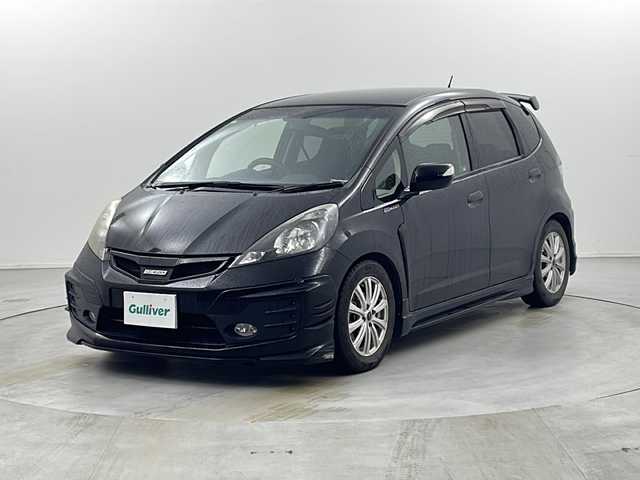 ホンダ フィット RS 栃木県 2010(平22)年 10.5万km クリスタルブラックパール 無限グリル/無限リアスポイラー/純正ナビ/　　CD/DVD/AM/FM/バックカメラ/ビルトインETC/純正フロアマット/レカロシート/オートライト/HID/リモコンキー/保証書・取説