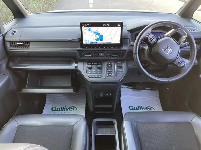 ホンダ ステップワゴン スパーダ eHEV 香川県 2022(令4)年 7.3万km プラチナホワイトパール 純正11.4型ナビ/フルセグTV/純正15.6型リア席モニター/両側パワースライドドア/マルチビューカメラ/ビルトインETC/アダプティブクルーズコントロール/ホンダセンシング/・衝突被害軽減ブレーキ/・車線逸脱防止支援/・前後誤発進抑制/・ブラインドスポットインフォメーション/・標識認識/・オートハイビーム/LEDヘッドランプ/革巻きステアリング/パドルシフト/合皮/撥水加工ファブリックコンビシート/前席シートヒーター/2列目キャプテンシート/オットマン/純正16インチアルミホイール/スマートキー/プッシュエンジンスタート/禁煙車