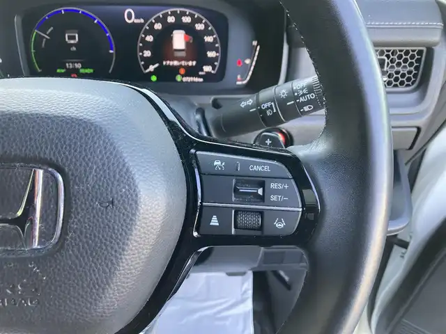 ホンダ ステップワゴン スパーダ eHEV 香川県 2022(令4)年 7.3万km プラチナホワイトパール 純正11.4型ナビ/フルセグTV/純正15.6型リア席モニター/両側パワースライドドア/マルチビューカメラ/ビルトインETC/アダプティブクルーズコントロール/ホンダセンシング/・衝突被害軽減ブレーキ/・車線逸脱防止支援/・前後誤発進抑制/・ブラインドスポットインフォメーション/・標識認識/・オートハイビーム/LEDヘッドランプ/革巻きステアリング/パドルシフト/合皮/撥水加工ファブリックコンビシート/前席シートヒーター/2列目キャプテンシート/オットマン/純正16インチアルミホイール/スマートキー/プッシュエンジンスタート/禁煙車