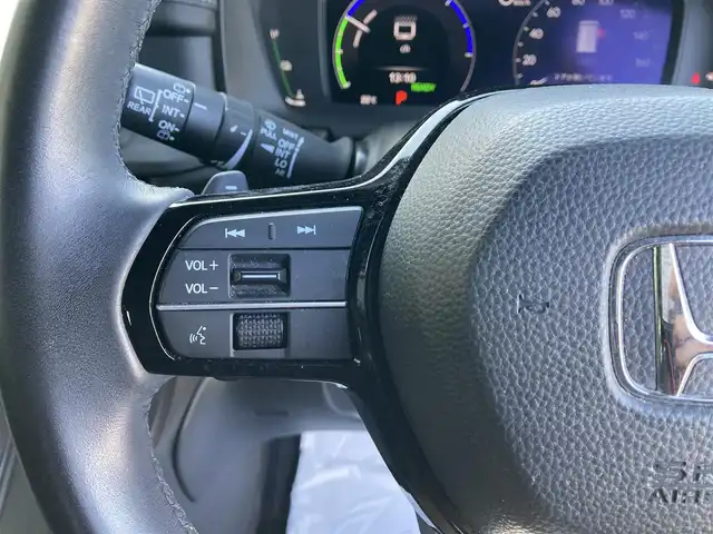ホンダ ステップワゴン スパーダ eHEV 香川県 2022(令4)年 7.3万km プラチナホワイトパール 純正11.4型ナビ/フルセグTV/純正15.6型リア席モニター/両側パワースライドドア/マルチビューカメラ/ビルトインETC/アダプティブクルーズコントロール/ホンダセンシング/・衝突被害軽減ブレーキ/・車線逸脱防止支援/・前後誤発進抑制/・ブラインドスポットインフォメーション/・標識認識/・オートハイビーム/LEDヘッドランプ/革巻きステアリング/パドルシフト/合皮/撥水加工ファブリックコンビシート/前席シートヒーター/2列目キャプテンシート/オットマン/純正16インチアルミホイール/スマートキー/プッシュエンジンスタート/禁煙車