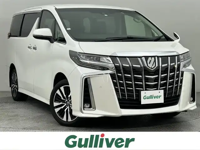 トヨタ アルファード SC 道央・札幌 2018(平30)年 2.3万km ホワイトパールクリスタルシャイン ・ワンオーナー/・４WD/・寒冷地仕様/・アルパイン11インチナビゲーション/　CD/DVD/フルセグ/SD/BT/・社外フリップダウンモニター/・純正ビルトインETC/・バックカメラ/・両側パワースライドドア/・パワーバックドア/・プリクラッシュセーフティ/・レーダークルーズコントロール/・横滑り防止装置/・前後コーナーセンサー/・レーンキープアシスト/・ロードサインアシスト/・先行車発進通知/・オートブレーキホールド/・１００V充電/・前席パワーシート/・レザーシート/・前席シートヒーター/エアシート/・ステアリングヒーター/・オットマン/・オートライト/・オートマチックハイビーム/・LEDヘッドライト/・フロントフォグライト/・純正フロアマット　（助手席/2列目一部欠品）/・スマートキー/・プッシュスタート/・純正AW18インチ/・nanoe
