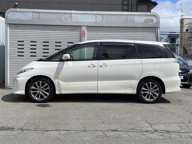 トヨタ エスティマ アエラス 道央・札幌 2013(平25)年 11.1万km ホワイトパールクリスタルシャイン (株)IDOMが運営する【じしゃロン札幌店】の自社ローン専用車両になります。こちらは現金またはオートローンご利用時の価格です。自社ローンご希望の方は別途その旨お申付け下さい。/純正HDDナビ/フルセグテレビ/バックカメラ/クルーズコントロール/ドアバイザー/プッシュスタート/両側パワースライドドア/ETC/HIDヘッドライト/オートライト/ステアリングスイッチ/革巻きステアリング/電動格納ミラー/ワイパーデアイサー/純正フロアマット/スマートキー