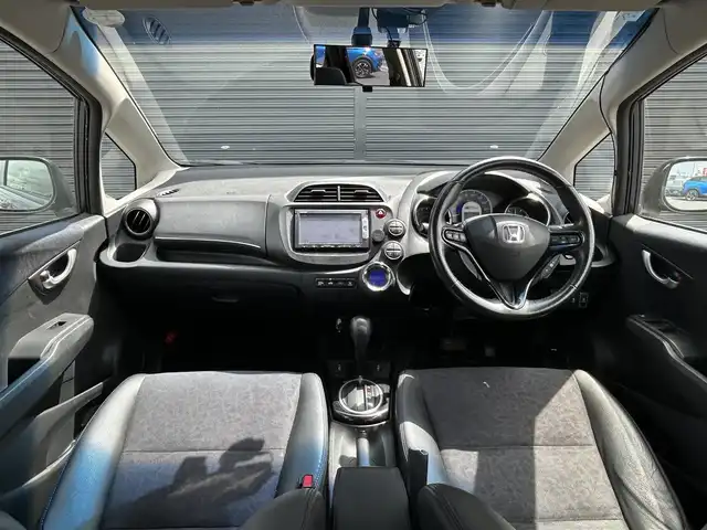 ホンダ フィット シャトル ハイブリッド スマートセレ クールED 茨城県 2014(平26)年 12.6万km プレミアムブルームーンパール 純正ナビ　/ＴＶ　/ＢＴ　/ＤＶＤ　/ＣＤ　/バックカメラ　/ハーフレザーシート　/シートヒーター　/ＥＴＣ　/ドラレコ　/オートライト　/オートエアコン　/フロアマット　/純正１５インチアルミホイール　/禁煙車