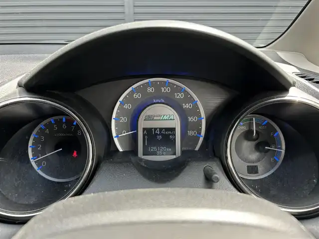 ホンダ フィット シャトル ハイブリッド スマートセレ クールED 茨城県 2014(平26)年 12.6万km プレミアムブルームーンパール 純正ナビ　/ＴＶ　/ＢＴ　/ＤＶＤ　/ＣＤ　/バックカメラ　/ハーフレザーシート　/シートヒーター　/ＥＴＣ　/ドラレコ　/オートライト　/オートエアコン　/フロアマット　/純正１５インチアルミホイール　/禁煙車