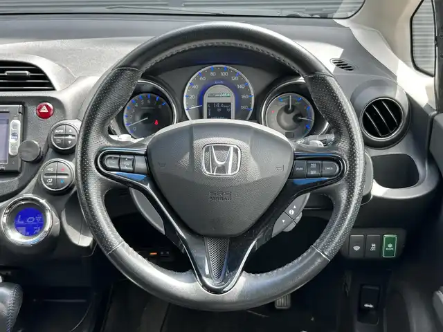 ホンダ フィット シャトル ハイブリッド スマートセレ クールED 茨城県 2014(平26)年 12.6万km プレミアムブルームーンパール 純正ナビ　/ＴＶ　/ＢＴ　/ＤＶＤ　/ＣＤ　/バックカメラ　/ハーフレザーシート　/シートヒーター　/ＥＴＣ　/ドラレコ　/オートライト　/オートエアコン　/フロアマット　/純正１５インチアルミホイール　/禁煙車