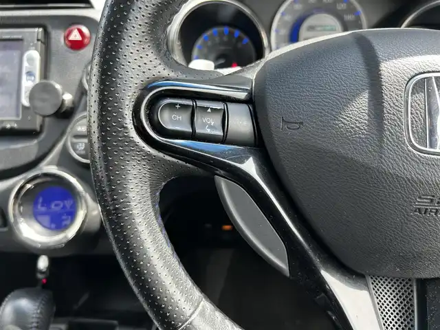 ホンダ フィット シャトル ハイブリッド スマートセレ クールED 茨城県 2014(平26)年 12.6万km プレミアムブルームーンパール 純正ナビ　/ＴＶ　/ＢＴ　/ＤＶＤ　/ＣＤ　/バックカメラ　/ハーフレザーシート　/シートヒーター　/ＥＴＣ　/ドラレコ　/オートライト　/オートエアコン　/フロアマット　/純正１５インチアルミホイール　/禁煙車