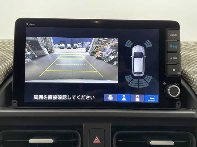 ホンダ フリード ハイブリット e:HEV AIR 長野県 2025(令7)年 0.1万km未満 プラチナホワイトパール 4WD/寒冷地仕様/純正9インチナビ　LXM-242ZFNI/（フルセグ/Bluetooth/AppleCarPlay/AndroidAuto)/バックカメラ/衝突軽減ブレーキ/レーンキープアシスト/レーダークルーズコントロール/前後コーナーセンサー/踏み間違い防止/標識認識機能/先行車発進機能/両側電動スライドドア/前席シートヒーター/LEDヘッドライト/オートライト/電子パーキングブレーキ/ブレーキホールド/ステアリングスイッチ/取扱説明書/保証書/スマートキー/スペアキー