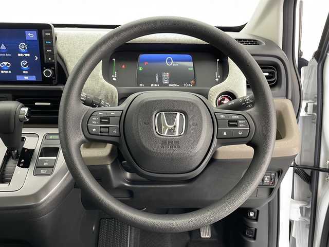 ホンダ フリード ハイブリット e:HEV AIR 長野県 2025(令7)年 0.1万km未満 プラチナホワイトパール 4WD/寒冷地仕様/純正9インチナビ　LXM-242ZFNI/（フルセグ/Bluetooth/AppleCarPlay/AndroidAuto)/バックカメラ/衝突軽減ブレーキ/レーンキープアシスト/レーダークルーズコントロール/前後コーナーセンサー/踏み間違い防止/標識認識機能/先行車発進機能/両側電動スライドドア/前席シートヒーター/LEDヘッドライト/オートライト/電子パーキングブレーキ/ブレーキホールド/ステアリングスイッチ/取扱説明書/保証書/スマートキー/スペアキー