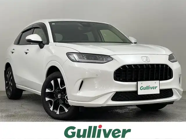 ホンダ ＺＲ－Ｖ Z 道央・札幌 2023(令5)年 0.5万km プラチナホワイトパール ・４WD/・寒冷地仕様/・BOSEプレミアムサウンド/・ホンダセンシング/・純正メモリナビ/・ホンダコネクトディスプレイ/・BT/USB/AppleCarPlay/AndroidAuto/・フルセグテレビ/・アラウンドビューモニター/・前後ドライブレコーダー/・ビルトインETC2.0/・レザーシート/・D＋N席パワーシート/・パワーバックドア/・レーダークルーズコントロール/・アイドリングストップ/・前後コーナーセンサー/・レーンキープアシスト/・ブラインドスポットモニター/・ステアリングヒーター/・LEDヘッドライト/・オートライト/・オートマチックハイビーム/・保証書・取扱説明書