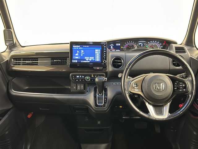 ホンダ Ｎ ＢＯＸ カスタム G L ホンダセンシング 道央・札幌 2017(平29)年 5.5万km シャイニンググレーM /4WD//純正ナビ：VXU-185NBi/(CD/DVD/BT/SD/フルセグ/ラジオ)//寒冷地仕様//ホンダセンシング//バックカメラ//片側パワースライドドア//レーダークルーズコントロール//ビルトインETC//純正エンジンスターター //横滑り防止装置//レーンキープアシスト//オートエアコン//オートライト//フォグライト//シートヒーター（運転席、助手席）//スペアキー1本