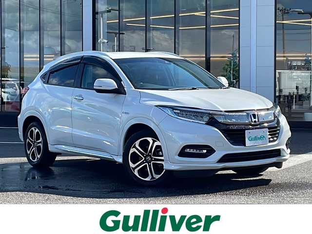 ホンダ ヴェゼル ハイブリッド Z ホンダセンシング 新潟県 2019(平31)年 4.3万km プラチナホワイトパール 純正メモリナビ/（DTV/DVD/Bluetooth）/ホンダセンシング/衝突軽減/レーンキープアシスト/先行発進検知/クルーズコントロール/バックカメラ/ビルドインETC/ハーフレザーシート/シートヒーター/革巻きステア/パドルシフト/防眩ミラー/フロアマット/LEDヘッドライト/フォグランプ/ウィンカーミラー/電格ミラー/ドアバイザー