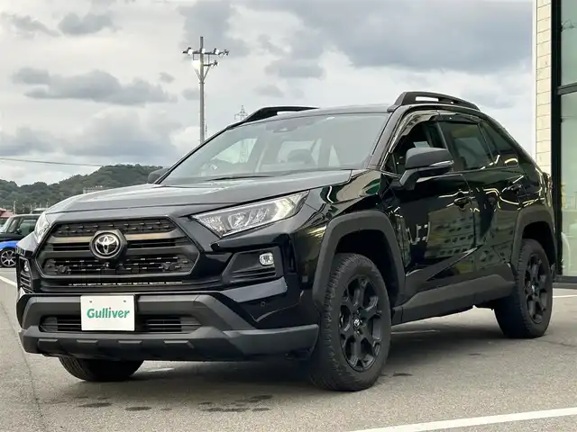 トヨタ ＲＡＶ４ アドベンチャー オフロードPKGⅡ 愛媛県 2022(令4)年 3.3万km アティチュードブラックマイカ 純正10.5型ディスプレイオーディオ/全周囲カメラ/黒革温冷シート/運転席メモリー機能付パワーシート/トヨタセーフティセンス/レーダークルーズコントロール/衝突被害軽減装置/車線逸脱防止装置/ブラインドスポットモニター/クリアランスソナー/電動リアゲート/デジタルインナーミラー/ブラックルーフレール/電動パーキングブレーキ/Autohold/ステアリングヒーター/ステアリングリモコン/電格ミラー/LEDヘッドライト/オートマチックハイビーム/タイプC充電/現状サマー(純正AW)(225/60/R18)/FALKEN WILDPEAK A/T TRAIL 0A
