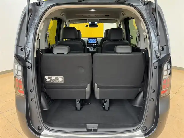 ホンダ フリード ハイブリット e:HEV クロスター 群馬県 2024(令6)年 1.2万km ソニックグレーパール ホンダセンシング/・路外逸脱抑制機能/・ブラインドスポットインフォメーション/・踏み間違い衝突軽減システム/・パーキングセンサー警報/・アダプティブクルーズコントロール/純正9インチナビ/・フルセグTV/・BT/AppleCarPlay/AndroidAuto/USB/・FM/AM/マルチビューカメラシステム/ビルトインETC/ドライブレコーダー/両側パワースライドドア/革巻きステアリング/ステアリングスイッチ/ブラックハーフレザーシート/前席シート/スマートキー/プッシュスタート/電子パーキング/ブレーキーオートホールド/LEDヘッドライト/フォグランプ/オートライト/オートマチックハイビーム/ルーフレール/純正フロアマット/リヤサーキュレーター/電動格納ウィンカーミラー/横滑り防止機能