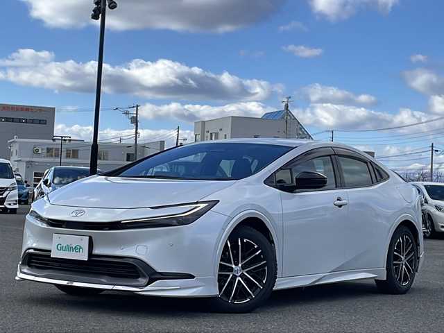 トヨタ プリウス Z 道央・札幌 2024(令6)年 3.6万km プラチナホワイトパールマイカ ワンオーナー/モデリスタ/純正ディスプレイオーディオ/【ＢＴ／ＨＤＭＩ／Ｍｉｒａｃａｓｔ／ＵＳＢ】/ワイアレス充電/パノラミックビューモニター/デジタルインナーミラー/ＵＳＢ出力電源/ＡＣ１００Ｖ/トヨタプロアクティブドライビングシステム/プリクラッシュセーフティ/ブラインドスポットモニタリング/自動駐車アシスト/レーダークルーズコントロール/レーンディパーチャアラート/フロント／リアクロストラフィックアラート/リヤカメラディテクション/安心降車アシスト/後方車両接近通知/周辺車両接近時サポート/ロードサインアシスト/レーンチェンジアシスト/パーキングサポートブレーキ/革巻きステアリング/ステアリングスイッチ/ステアリングヒーター/レザーシート/運転席パワーシート/運転席シートメモリ/前席シートヒーター／エアシート/オートライト/オートハイビーム/ＬＥＤ/フォグランプ/フロントワイパーデアイサー/レインセンサー/ドアミラーヒーター/オート電動格納ミラー/ビルトインＥＴＣ/純正フロアマット/スペアキー