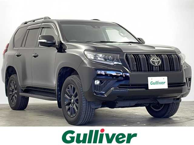 トヨタ ランドクルーザー プラド TX Lパッケージ マットブラED 大阪府 2023(令5)年 2.6万km ブラック 純正ディスプレイオーディオ/【ナビ/BT/USB】/パノラミックビューモニター/サンルーフ/ETC2.0/ブラインドスポットモニター/プリクラッシュセーフティ/レーダークルーズコントロール/コーナーセンサー前後/先行車発進アラーム/レーンキープアシスト/オートライト/電動格納三列目シート/シートヒーター/シートベンチレーション/パワーシート　D+N席/純正18インチAW/純正フロアマット