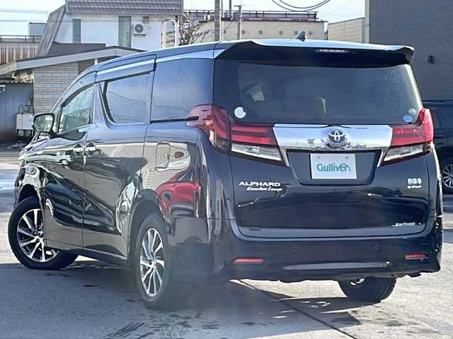 トヨタ アルファードハイブリット エグゼクティブ ラウンジ 道北・旭川 2017(平29)年 7.4万km ブラック /禁煙車//4WD//ワンオーナー//JBLプレミアムサウンドシステム（１７スピーカー）//ツインムーンルーフ//純正ナビ/ CD/DVD/BT/SD/USB/フルセグ//パノラミックビューモニター//純正フリップダウンモニター//セミアニリン革シート//パワーシート//シートヒーター//両側パワースライドドア//ステアリングヒーター//パワーバックドア//ミラーヒーター//助手席パワーオットマン//アクセサリーコンセント5個//リアサンシェード//プリクラッシュセーフティシステム//インテリジェントクリアランスソナー//レーダークルーズコントロール//オートハイビーム//オートライト//LEDヘッドライト//LEDフォグランプ//ドライブレコーダー//横滑り防止//保証書