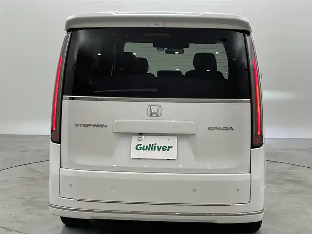 ホンダ ステップワゴン スパーダ 福岡県 2022(令4)年 3.9万km プラチナホワイトパール 後席モニター　/純正ナビ　/全方位カメラ　/ＥＴＣ　/ドラレコ　/ＡＣＣ　/コーナーセンサー　/衝突被害軽減　/レーンキープ　/ＢＳＭ　/パドルシフト　/両側電動スライドドア　/パワーバックドア　/ハーフレザー　/シートヒーター