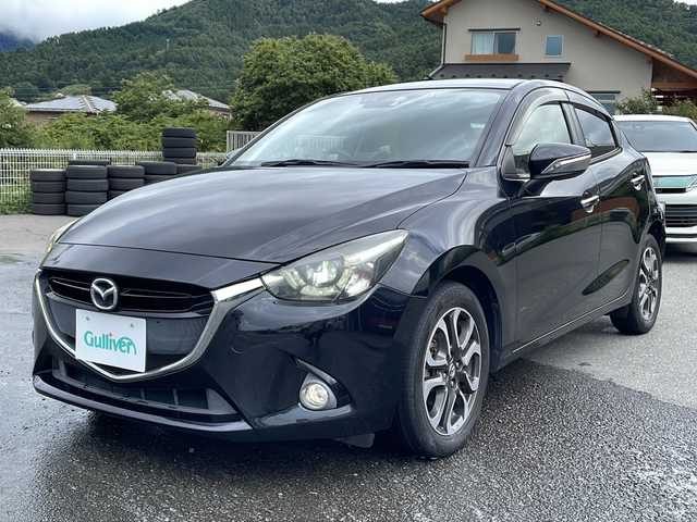 マツダ デミオ XD ブラックレザーリミテッド 山梨県 2016(平28)年 8.1万km ジェットブラックマイカ 〇マツダコネクトナビ/〇フルセグTV/〇バックモニター/〇ETC/〇ドライブレコーダー/〇クルーズコントロール/〇スマートシティブレーキサポート/〇LEDヘッドランプ/〇純正16インチアルミホイール/〇ステアリングスイッチ/〇オートエアコン/〇プッシュスタートボタン/〇アドバンストキーレスエントリーシステム/〇SRSエアバック（運転席・助手席・サイド・カーテン）