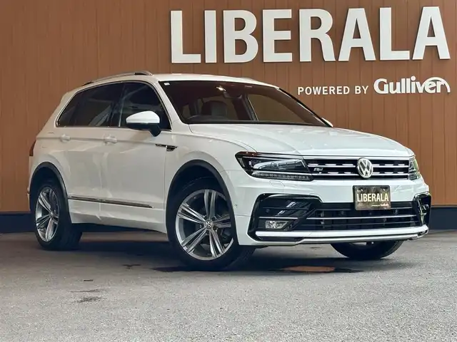 フォルクスワーゲン ティグアン TDI 4モーション Rライン 宮城県 2018(平30)年 7.6万km ピュアホワイト 純正ナビ/全周囲カメラ/AppleCarPlay/AndroidAuto/ハーフレザー/シートヒーター/アイドリングストップ/ACC/レーンキープアシスト/ブラインドスポットモニター/プリクラッシュブレーキ/コーナーセンサー/ステアリングスイッチ/パドルシフト/電動パーキング/オートホールド/バーチャルコックピット/USB×２/LEDヘッドライト/フロントフォグ/保証書/取扱説明書/スペアキー×１