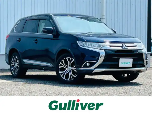 三菱 アウトランダー 20G セーフティパッケージ 熊本県 2017(平29)年 11.5万km コスミックブルーマイカ ワンオーナー/社外ナビ/・AM/FM/DVD/iPod/SD/AUX/USB/BT/・フルセグTV/バックカメラ/衝突被害軽減ブレーキ/レーンアシスト/横滑り防止機能/オートマチックハイビーム/アイドリングストップ/レーダークルーズコントロール/車線逸脱警報システム/革巻きステアリング/・ステアリングリモコン/・ステアリングヒーター/・パドルシフト/ETC/オートライト/・フォグランプ/・LEDライト/電動格納ミラー/・ウィンカーミラー/純正ドアバイザー/純正アルミホイール/社外フロアマット/スマートキー/・スペアキー