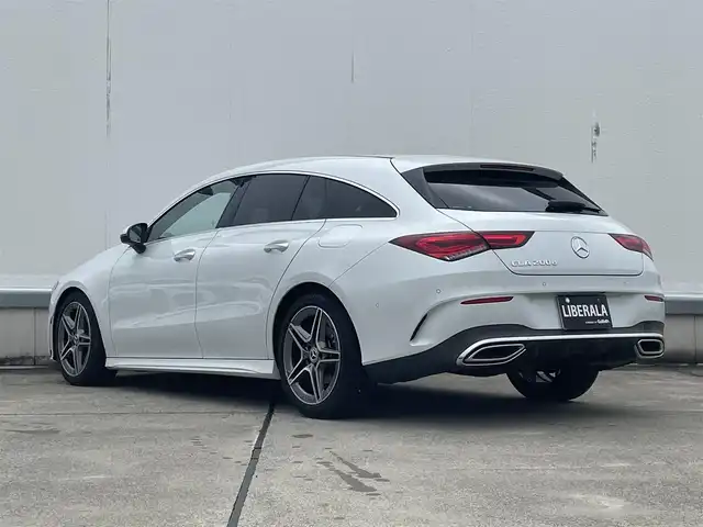 メルセデス・ベンツ ＣＬＡ２００ｄ Sブレーク AMGライン 東京都 2020(令2)年 6万km ポーラホワイト レーダーセーフティパッケージ/パークトロニック/ドライブアウェイアシスト/リアクロストラフィックアラート/マルチビームLEDヘッドランプ/アダプティブハイビームアシストプラス/シルバーダイヤモンドメッシュフロントグリル/開口部横バーブラックメッシュフロントエアロバンパー/サイドシルスポイラー/リアスポイラー/下部ラウンド型クローム加飾付リアエアロバンパー/225/45R18タイヤ/18インチAMG製5本ツインスポークアルミホイール/「Mercedes-Benz」ロゴ入りブレーキキャリバー(フラットボトム)/プライバシーガラス/DINAMICA(スエード調)貼インパネ加飾/レッドステッチ入ディンプルナッパ革巻きスポーツステアリングホイール(フラットボトム)/左右独立調整オートエアコン/リアエアコン吹き出し口/レッドステッチ入ブラック合皮/DINAMICA(スエード調)コンビスポーツシート/シートヒーター(D席/N席)/パワーシート(D席/N席)/イージーエントリー(D席/N席)/ステンレス製ペダル