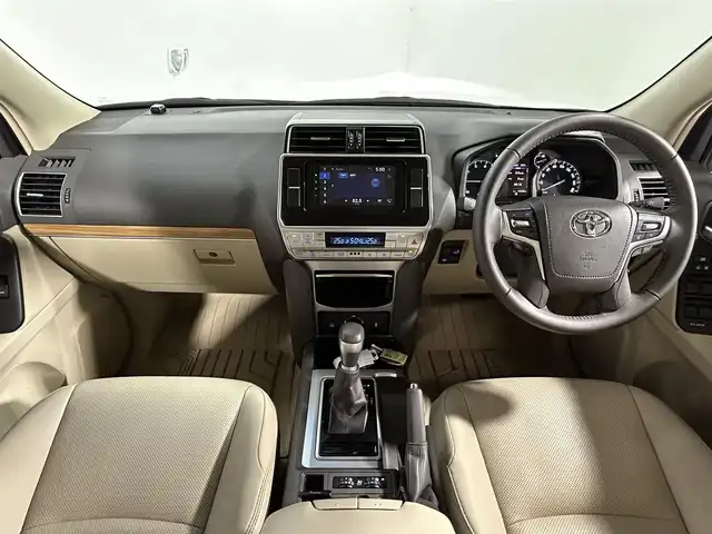 トヨタ ランドクルーザー プラド TX Lパッケージ 大阪府 2023(令5)年 1.7万km ホワイトパールクリスタルシャイン サンルーフ　革シート　社外エアロ　社外ディスプレイオーディオ　Ｂカメラ　パワーシート／ヒーター／エアコン　衝突軽減　レーダーＣ　クリアランスソナー　レーンアシスト　ルーフレール　前後ドラレコ　４ＷＤ