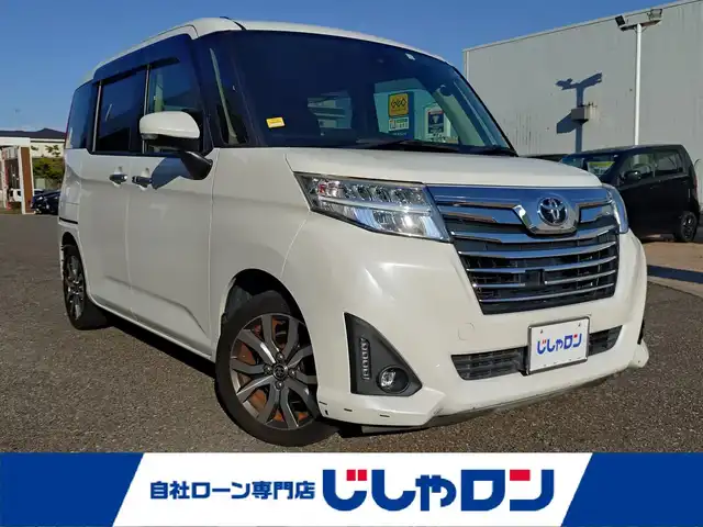 トヨタ ルーミー カスタムG－T 新潟県 2017(平29)年 10.9万km パールホワイトⅢ (株)IDOMが運営する【じしゃロン新潟店】の自社ローン専用車両になります。/こちらは現金またはオートローンご利用時の価格です。自社ローンご希望の方は別途その旨お申付け下さい/純正ナビ（地図SDなし）/CD/DVD視聴可能/フルセグTV視聴可能（走行中視聴可能）/バックカメラ/Bluetooth接続可能/ETC/プッシュスタート/クルーズコントロール/両側パワースライドドア/純正フロアマット/後ろのみコーナーセンサー/横滑り防止装置/衝突被害軽減システム/電動格納ウィンカーミラー/フォグランプ/スマートキー/スペアキー×１