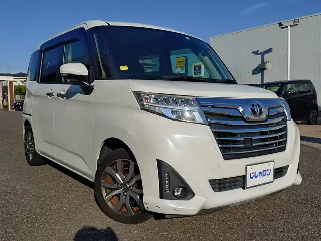 トヨタ ルーミー カスタムG－T 新潟県 2017(平29)年 10.9万km パールホワイトⅢ (株)IDOMが運営する【じしゃロン新潟店】の自社ローン専用車両になります。/こちらは現金またはオートローンご利用時の価格です。自社ローンご希望の方は別途その旨お申付け下さい/純正ナビ（地図SDなし）/CD/DVD視聴可能/フルセグTV視聴可能（走行中視聴可能）/バックカメラ/Bluetooth接続可能/ETC/プッシュスタート/クルーズコントロール/両側パワースライドドア/純正フロアマット/後ろのみコーナーセンサー/横滑り防止装置/衝突被害軽減システム/電動格納ウィンカーミラー/フォグランプ/スマートキー/スペアキー×１