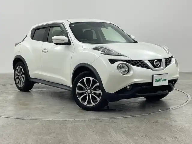 日産 ジューク 16GT FOUR 群馬県 2016(平28)年 3.6万km ブリリアントホワイトパール ・純正８インチナビ/・アラウンドビューモニター/・純正ドライブレコーダー（フロント）/・ETC/・４WD/・シートヒーター /・エアシート/・レーンアシスト/・横滑り防止装置/・衝突被害軽減システム/・盗難防止装置/・オートライト/・SRSエアバッグ（運転席/助手席）/・スマートキー/・純正フロアマット /・純正１７インチアルミホイール