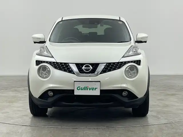 日産 ジューク 16GT FOUR 群馬県 2016(平28)年 3.6万km ブリリアントホワイトパール ・純正８インチナビ/・アラウンドビューモニター/・純正ドライブレコーダー（フロント）/・ETC/・４WD/・シートヒーター /・エアシート/・レーンアシスト/・横滑り防止装置/・衝突被害軽減システム/・盗難防止装置/・オートライト/・SRSエアバッグ（運転席/助手席）/・スマートキー/・純正フロアマット /・純正１７インチアルミホイール