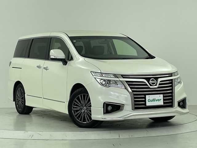 日産 エルグランド 250HWS アーバンクロム 大阪府 2017(平29)年 2.1万km ブリリアントホワイトパール フリップダウンモニター/純正メモリナビ/　　CD/DVD/BT/バックカメラ/両側パワースライドドア/クルーズコントロール/合皮ハーフレザーシート/オットマン/LEDオートライト/フォグランプ/純正18インチアルミホイール/スマートキー/ビルトインETC
